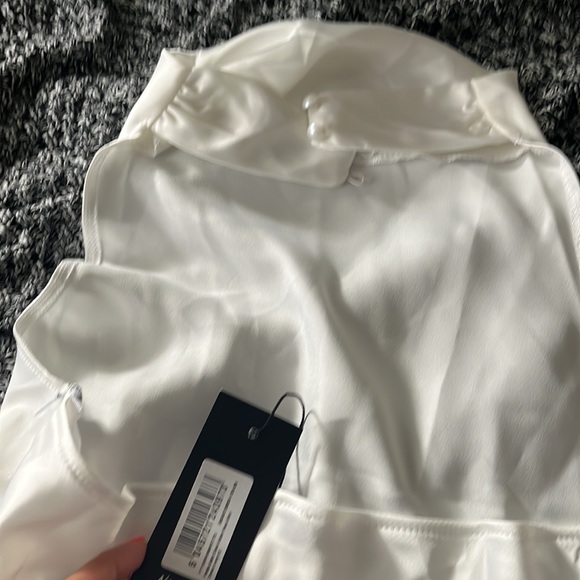 New mini white halter dress. Pearl like button details. Didn’t fit me. - Picture 3 of 3